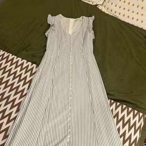 Long, pin striped, button down front with slit
